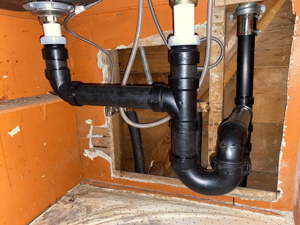 Professional Garbage Disposal Repair equipment and tools on the job in Durand